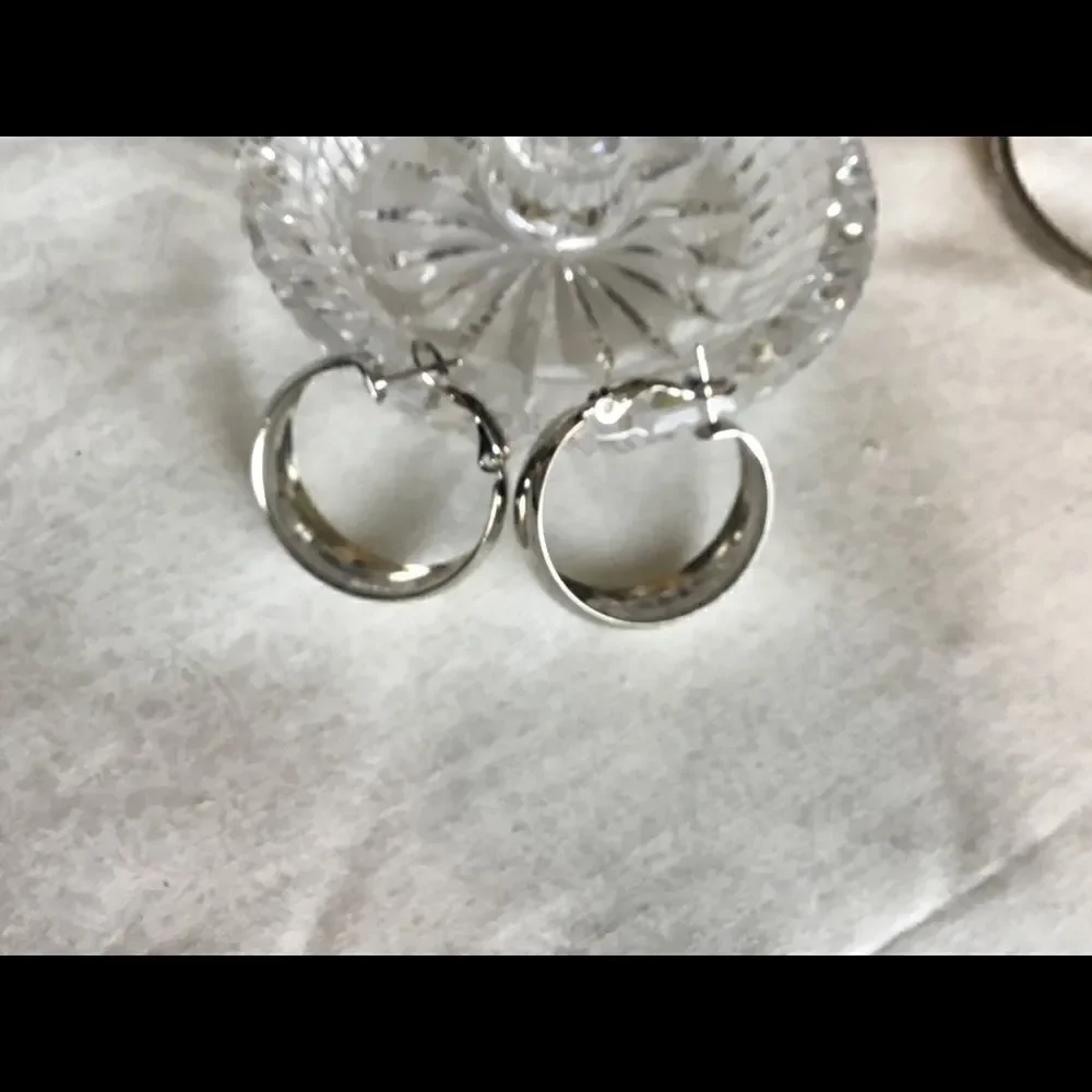 $8 ea or 3/$15. Silvertone  Shiny Hoop Earrings.